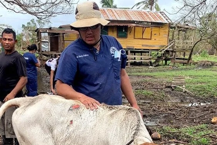 Carlos, his calf, & a community