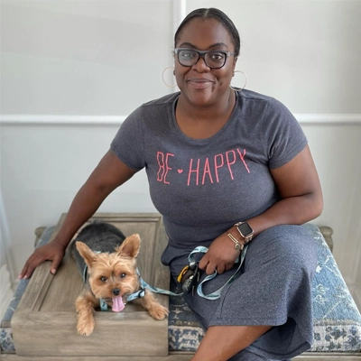 Videlle, owner of In Pups We Trust, with her dog.
