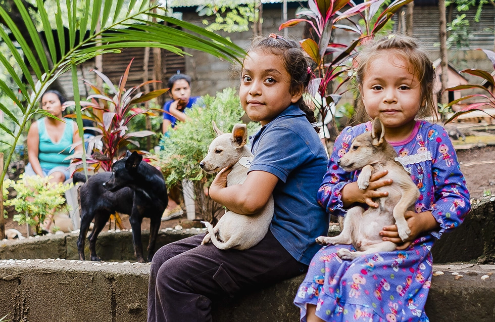 Children Caring for Puppies  | Global Strays Animal Welfare.
