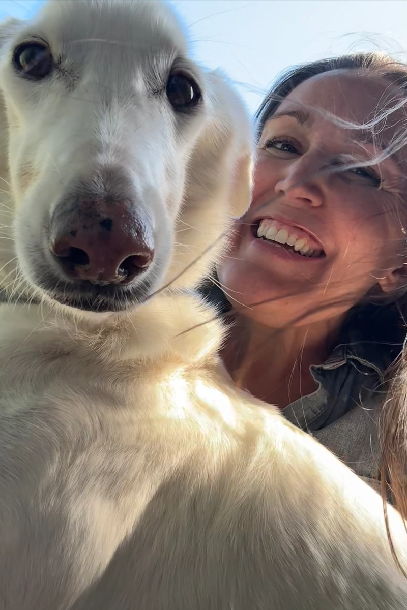 Global Stray's Director of Operations, Alison Flaherty and her dog.