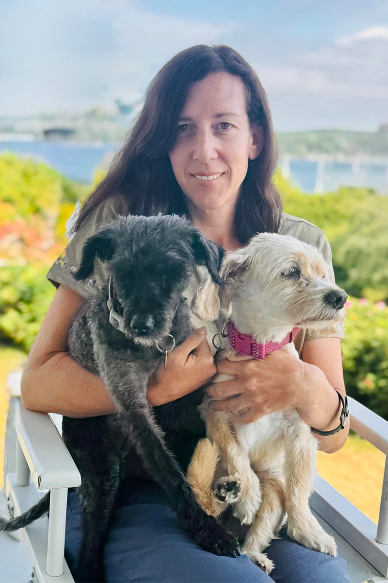 Global Stray's Senior International Programs Manager, Shannon Schissler and her dogs.